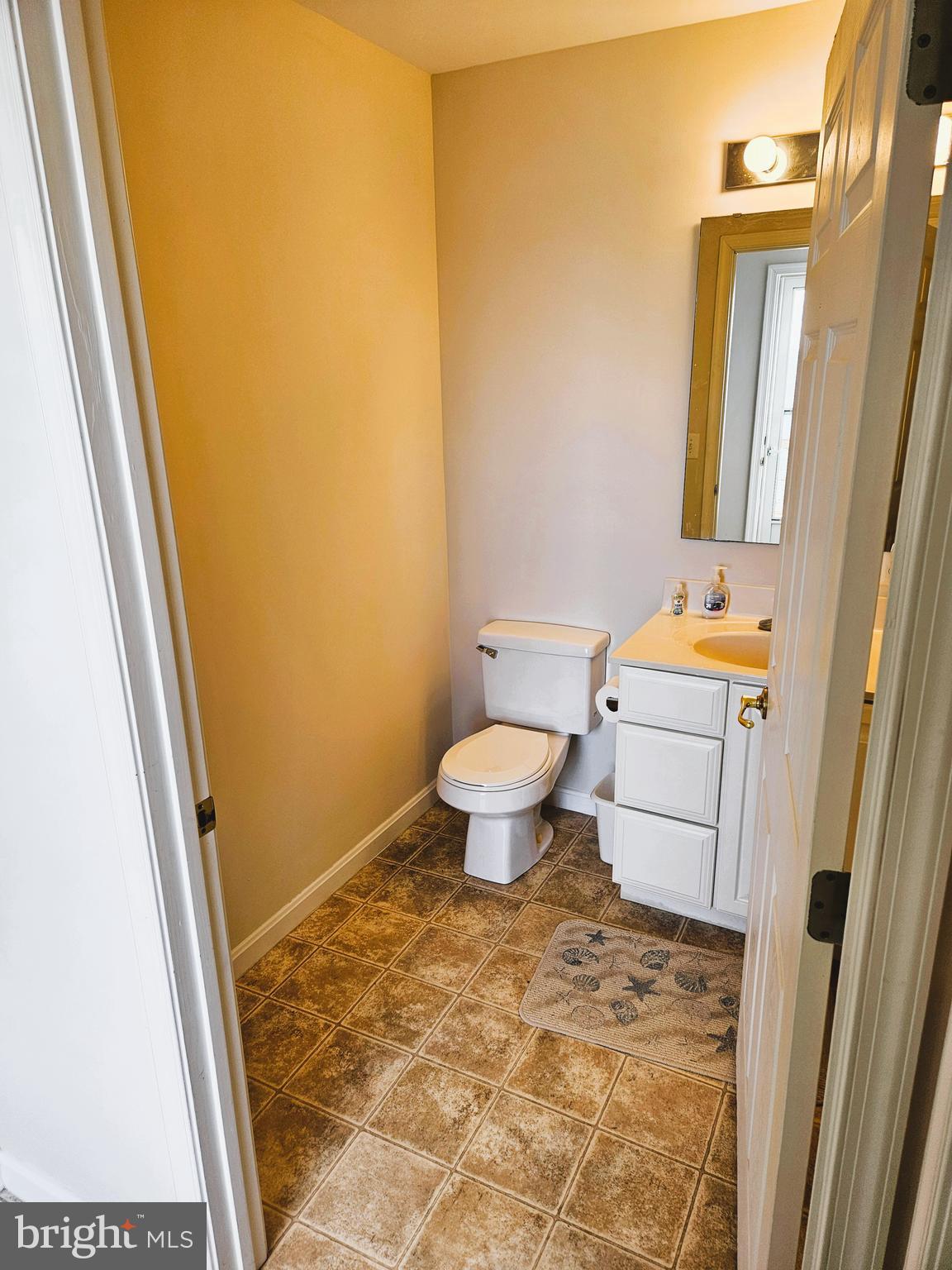 16340 Murray Road Ridge, MD 20680 - Photo 22 of 34 Main level 1/2 bath