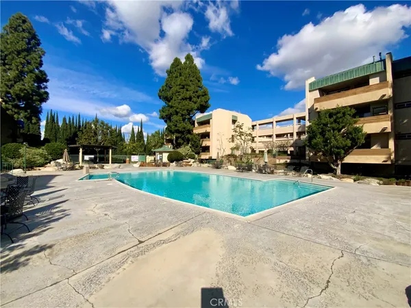 a view of outdoor space yard and swimming pool