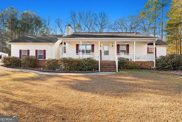 front view of a house with a street