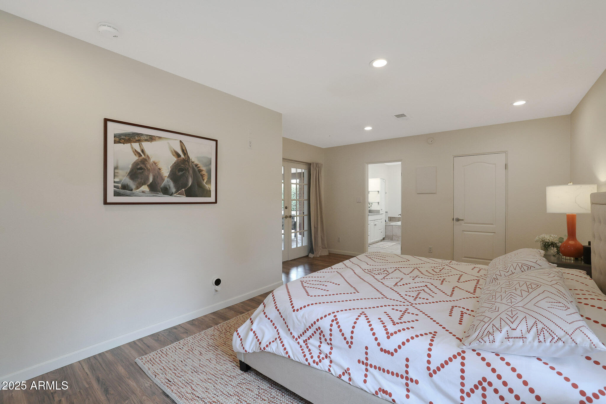 2226 East Fairmount Avenue Phoenix, AZ 85016 - Photo 25 of 50 a bedroom with a bed and a painting on the wall