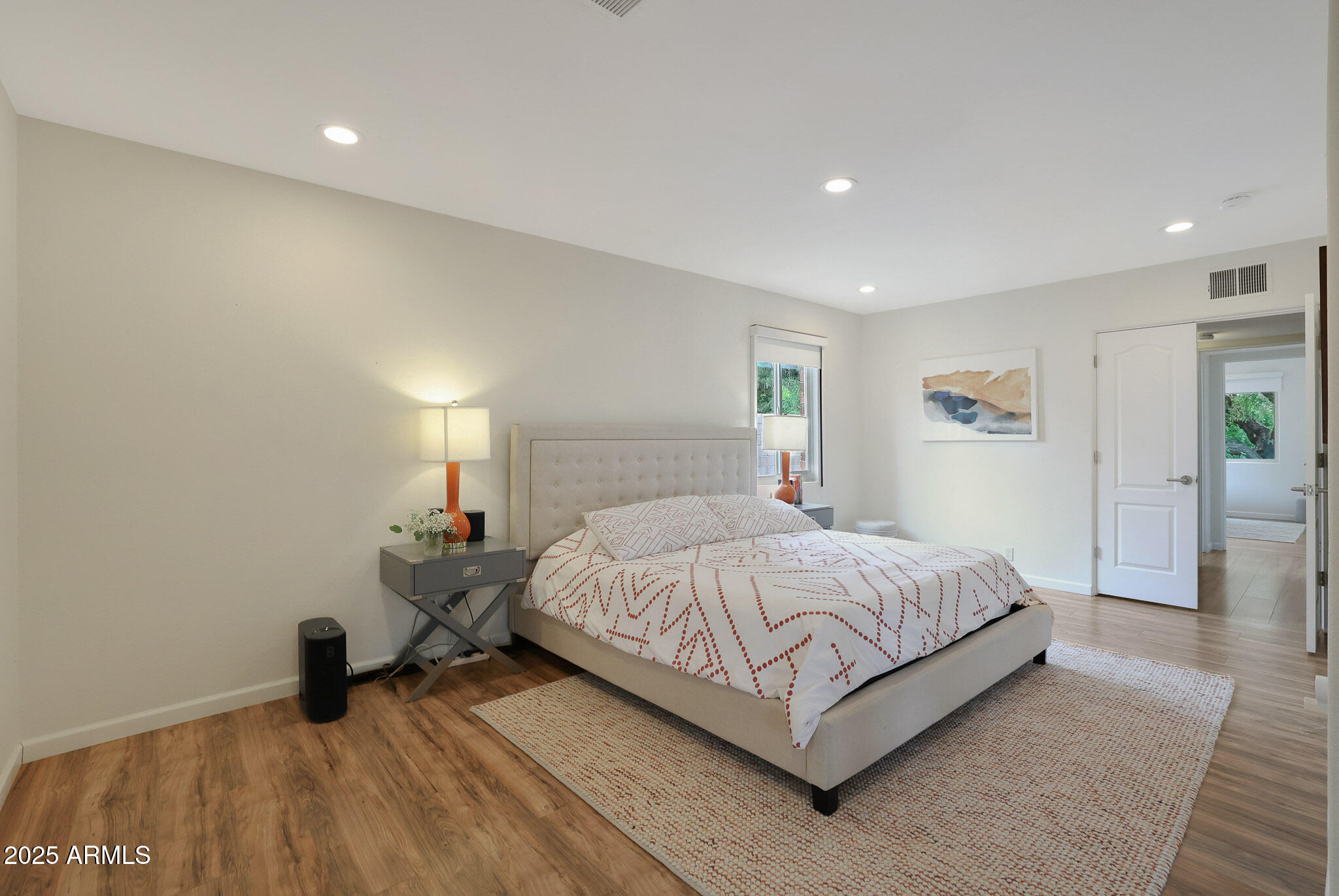 2226 East Fairmount Avenue Phoenix, AZ 85016 - Photo 27 of 50 a bedroom with a bed and a lamp