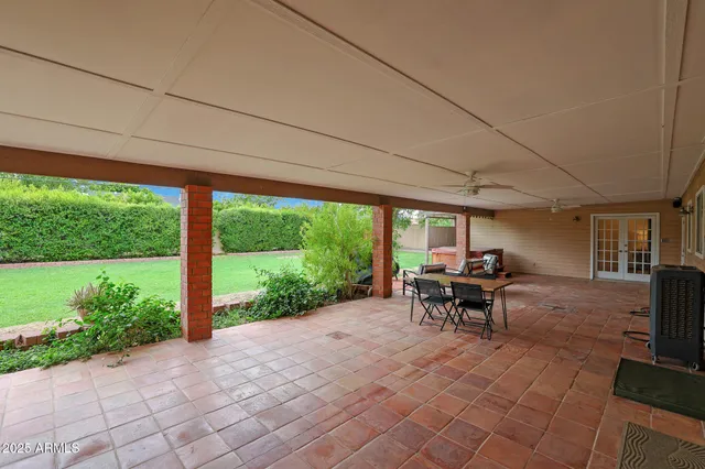 a very nice looking dining room with a table and chairs