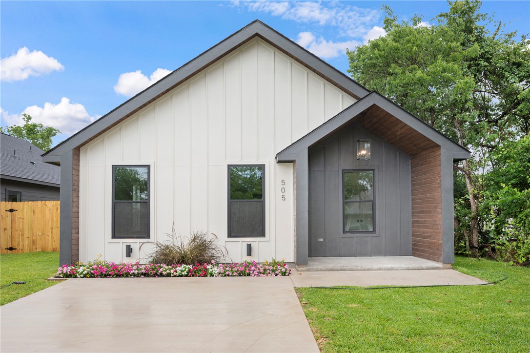 505 Legion Court Bryan, TX 77803 - Photo 2 of 21 a front view of a house with a garden