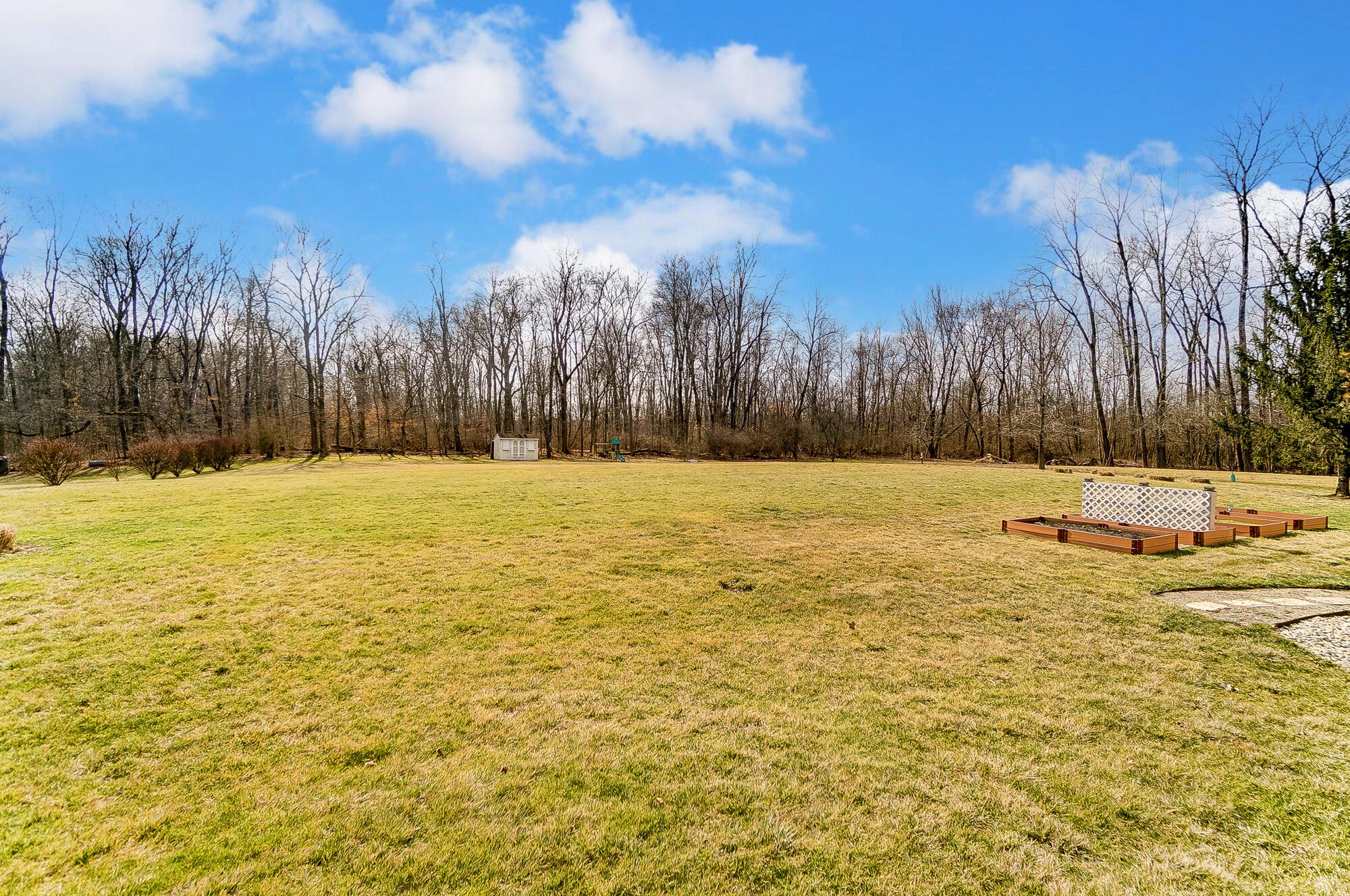 564 Kingsbury Road Delaware, OH 43015 - Photo 50 of 76 Back yard looks out to the treelined property where you can watch the deer roam