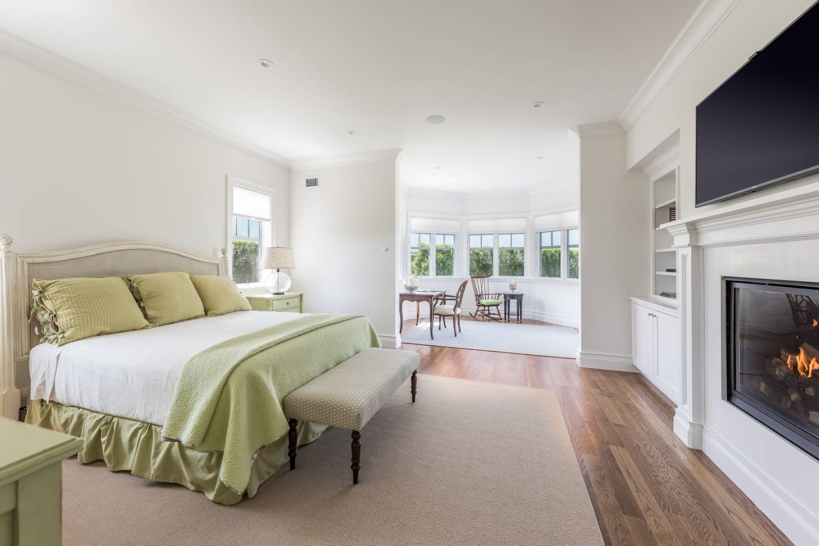 170 Scuttle Hole Road Water Mill, NY 11976 - Photo 16 of 35 a spacious bedroom with a bed and a flat screen tv