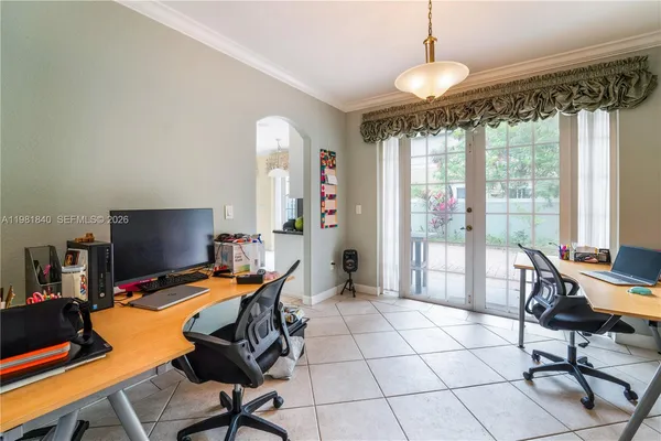a kitchen with stainless steel appliances a refrigerator and a stove
