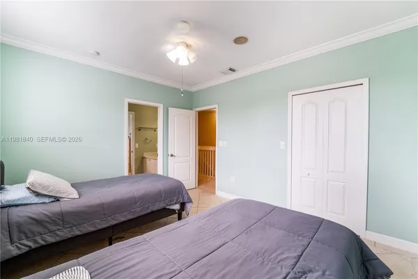 a bathroom with a double vanity sink mirror and double