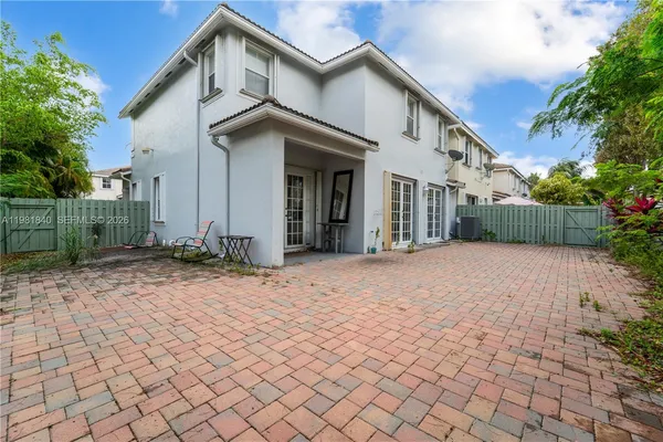 a terrace with outdoor seating and garden