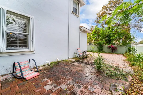 a view of front door of house with outdoor space