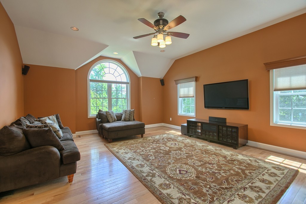72 Clement Road Dracut, MA 01826 - Photo 15 of 30 a living room with furniture and a flat screen tv