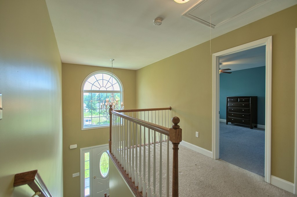 72 Clement Road Dracut, MA 01826 - Photo 18 of 30 a view of entryway with wooden floor