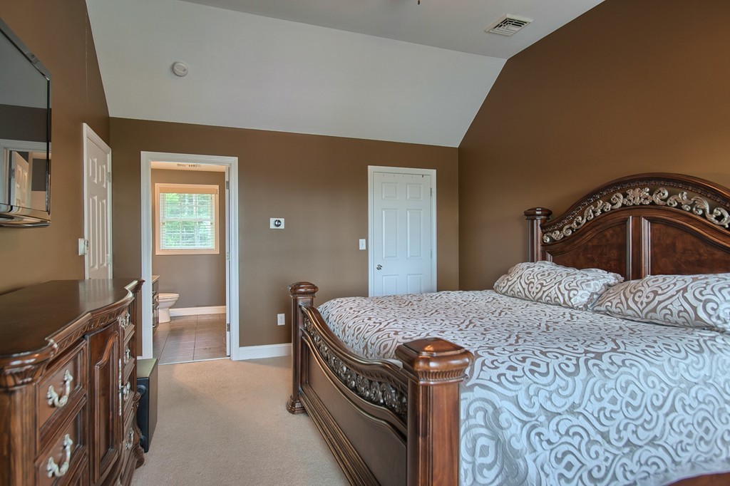 72 Clement Road Dracut, MA 01826 - Photo 20 of 30 a bedroom with a bed and dresser