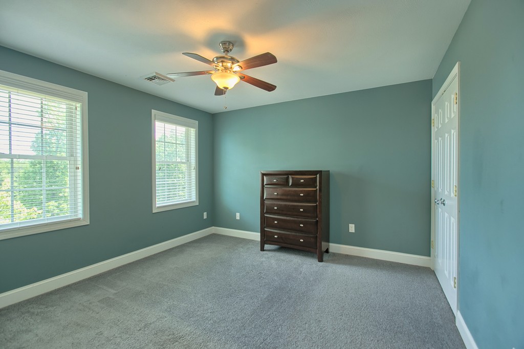 72 Clement Road Dracut, MA 01826 - Photo 23 of 30 an empty room with windows and fan