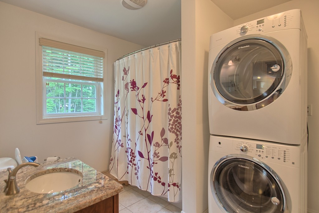 72 Clement Road Dracut, MA 01826 - Photo 26 of 30 a bathroom with a sink and a mirror
