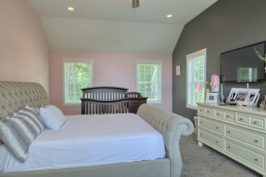 72 Clement Road Dracut, MA 01826 - Photo 28 of 30 a bedroom with a bed and a dresser
