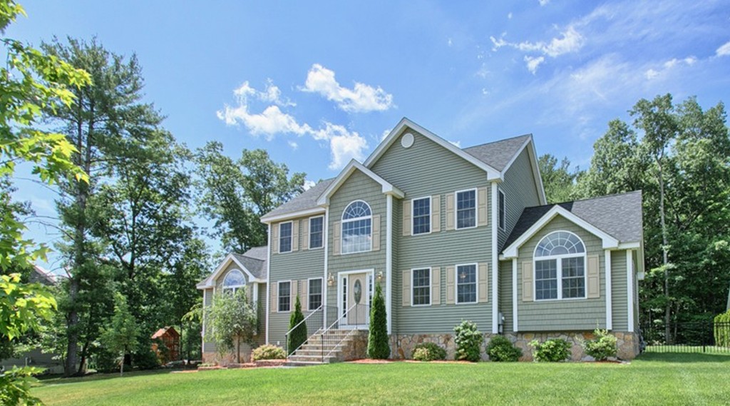 72 Clement Road Dracut, MA 01826 - Photo 30 of 30 a front view of a house with a yard