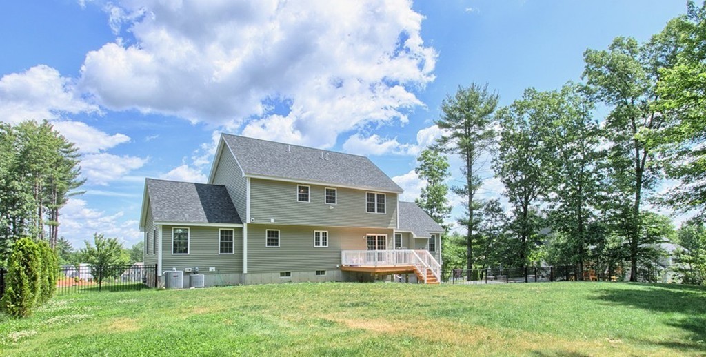 72 Clement Road Dracut, MA 01826 - Photo 6 of 30 front view of a house with a yard