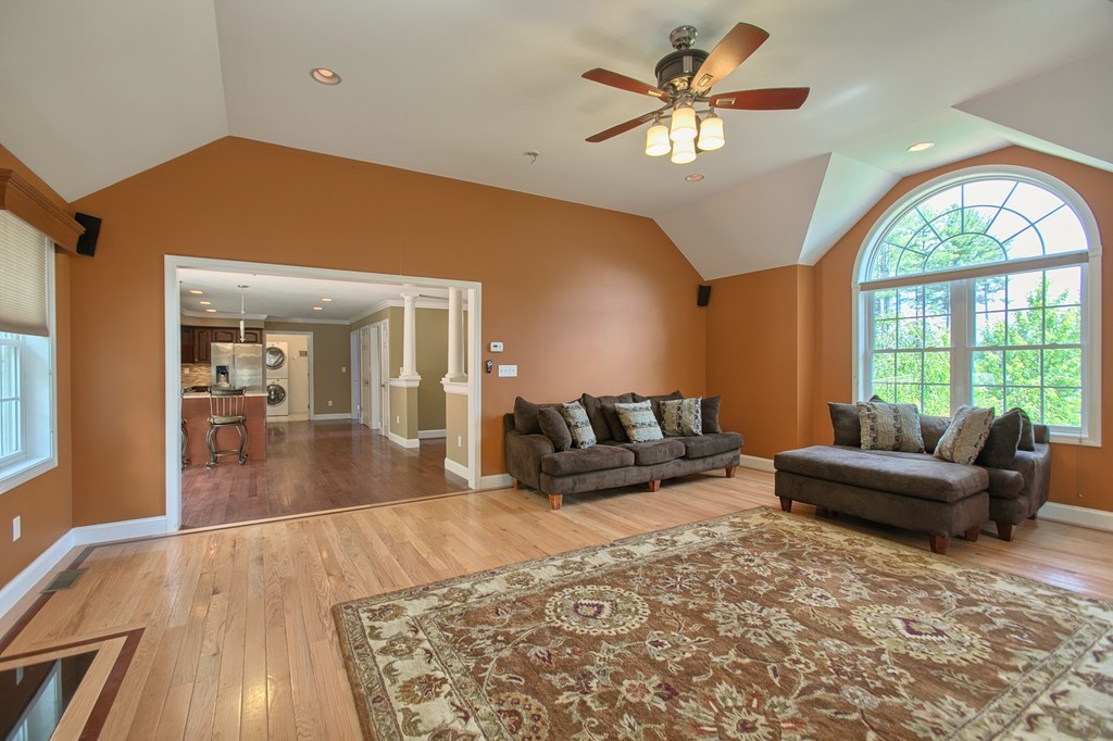 72 Clement Road Dracut, MA 01826 - Photo 8 of 30 a living room with furniture and a large window