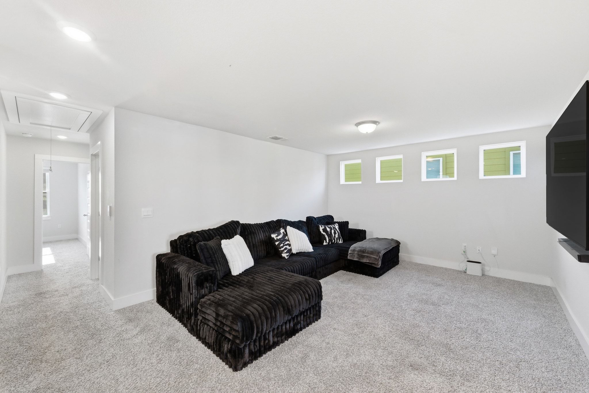 7416 Travertine Spring Drive, Unit 149 Austin, TX 78744 - Photo 16 of 36 a living room with furniture and a couch