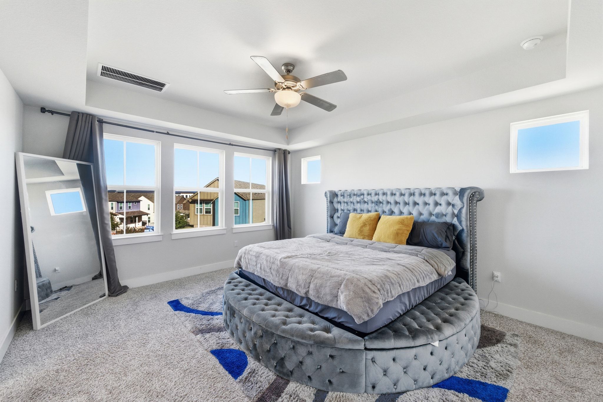 7416 Travertine Spring Drive, Unit 149 Austin, TX 78744 - Photo 19 of 36 a bedroom with furniture and a window