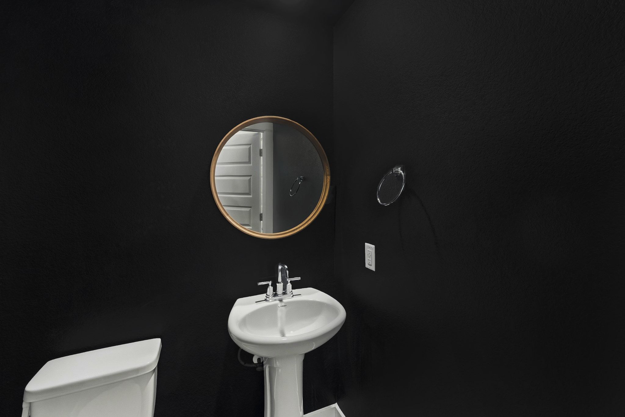 7416 Travertine Spring Drive, Unit 149 Austin, TX 78744 - Photo 29 of 36 a bathroom with a sink toilet and a mirror