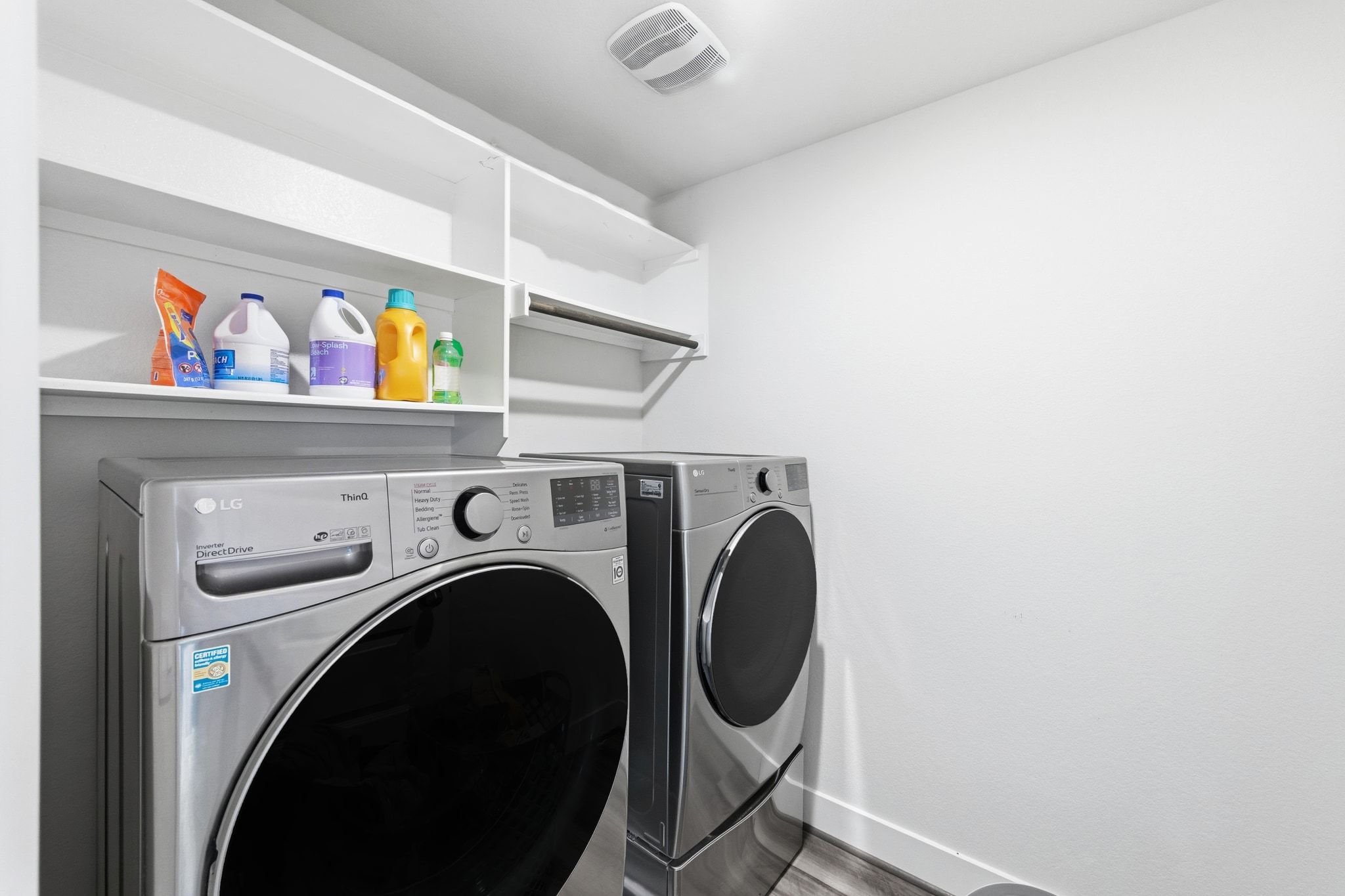 7416 Travertine Spring Drive, Unit 149 Austin, TX 78744 - Photo 30 of 36 a utility room with dryer and washer