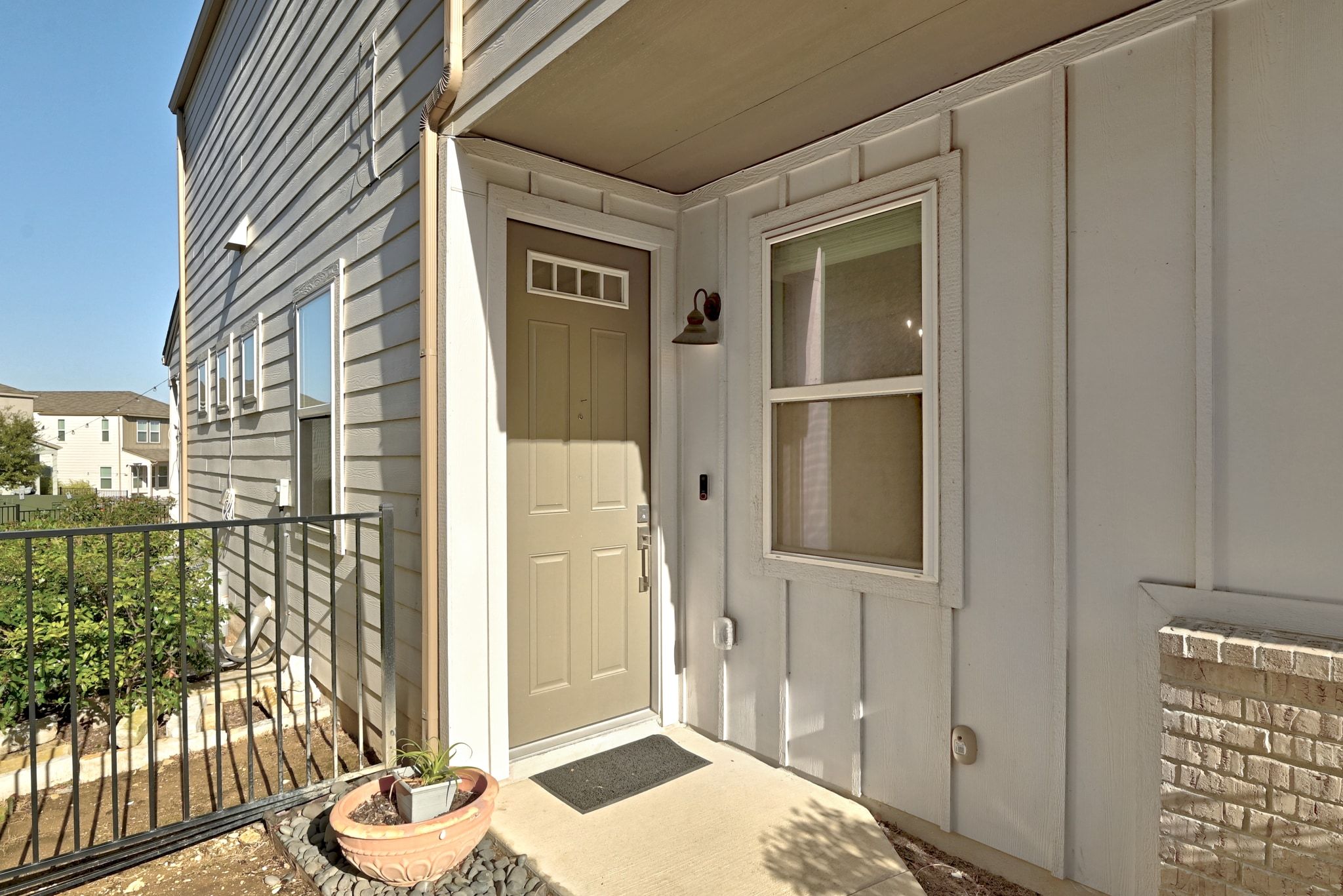 7416 Travertine Spring Drive, Unit 149 Austin, TX 78744 - Photo 36 of 36 a view of a balcony with wooden floor