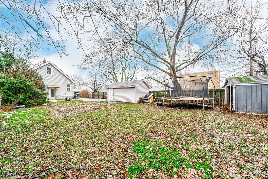 2014 Cook Avenue Cleveland, OH 44109 - Photo 36 of 37 View of yard featuring a storage shed and a trampoline