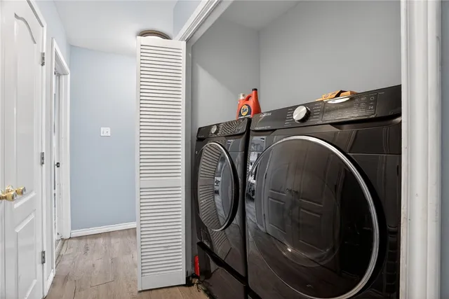 a utility room with dryer and washer