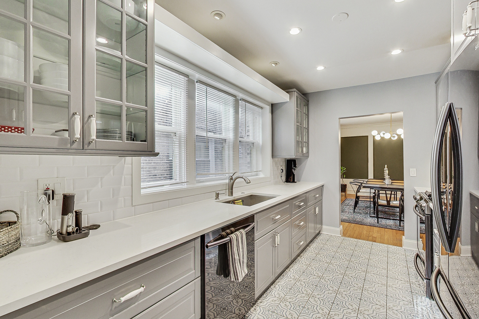 138 Custer Avenue, Unit 2 Evanston, IL 60202 - Photo 6 of 22 a kitchen with sink and window