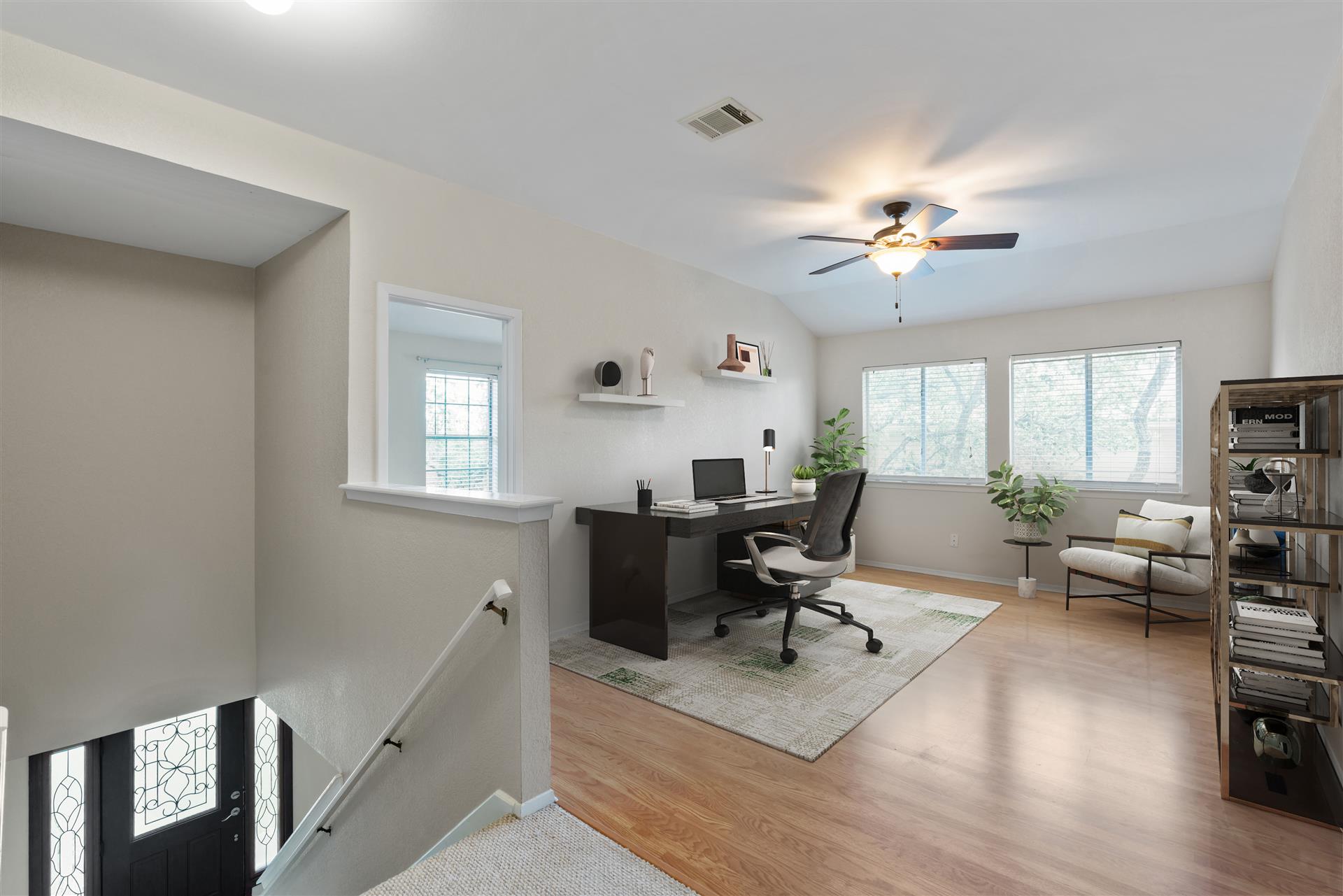 1710 Persimmon Road Cedar Park, TX 78613 - Photo 7 of 33 A versatile loft with sun-filled windows offers an ideal space for a home office or creative pursuits.