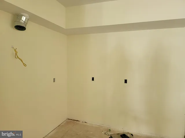 a view of room with gym equipment