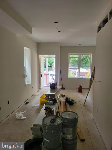 a room with furniture and a window