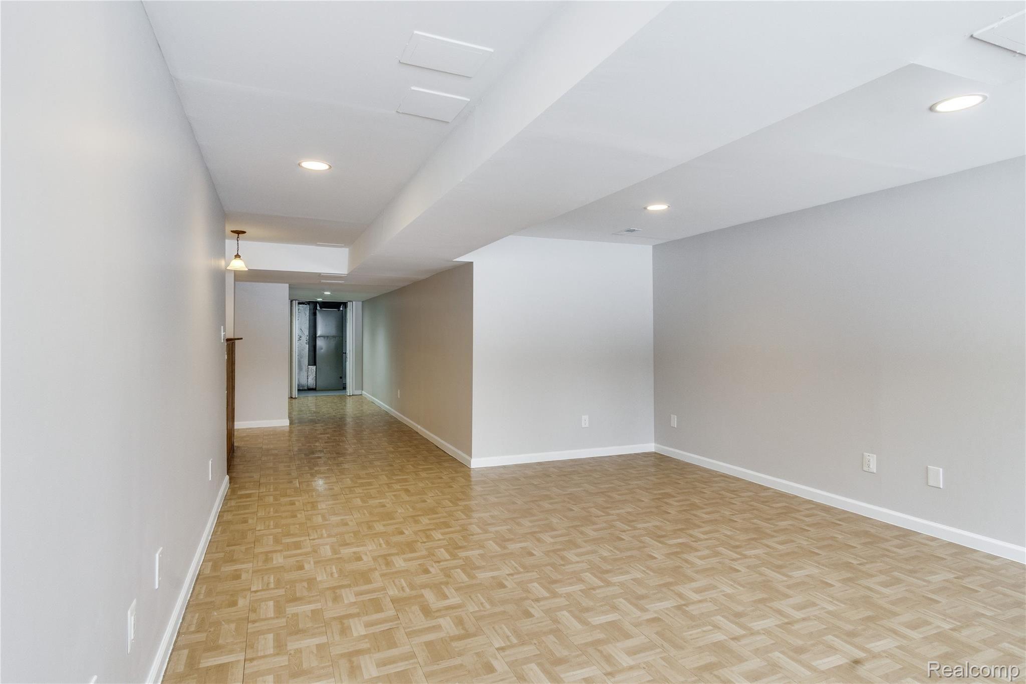 1533 Paramount Street Novi, MI 48377 - Photo 41 of 51 lower level with daylight windows and bar