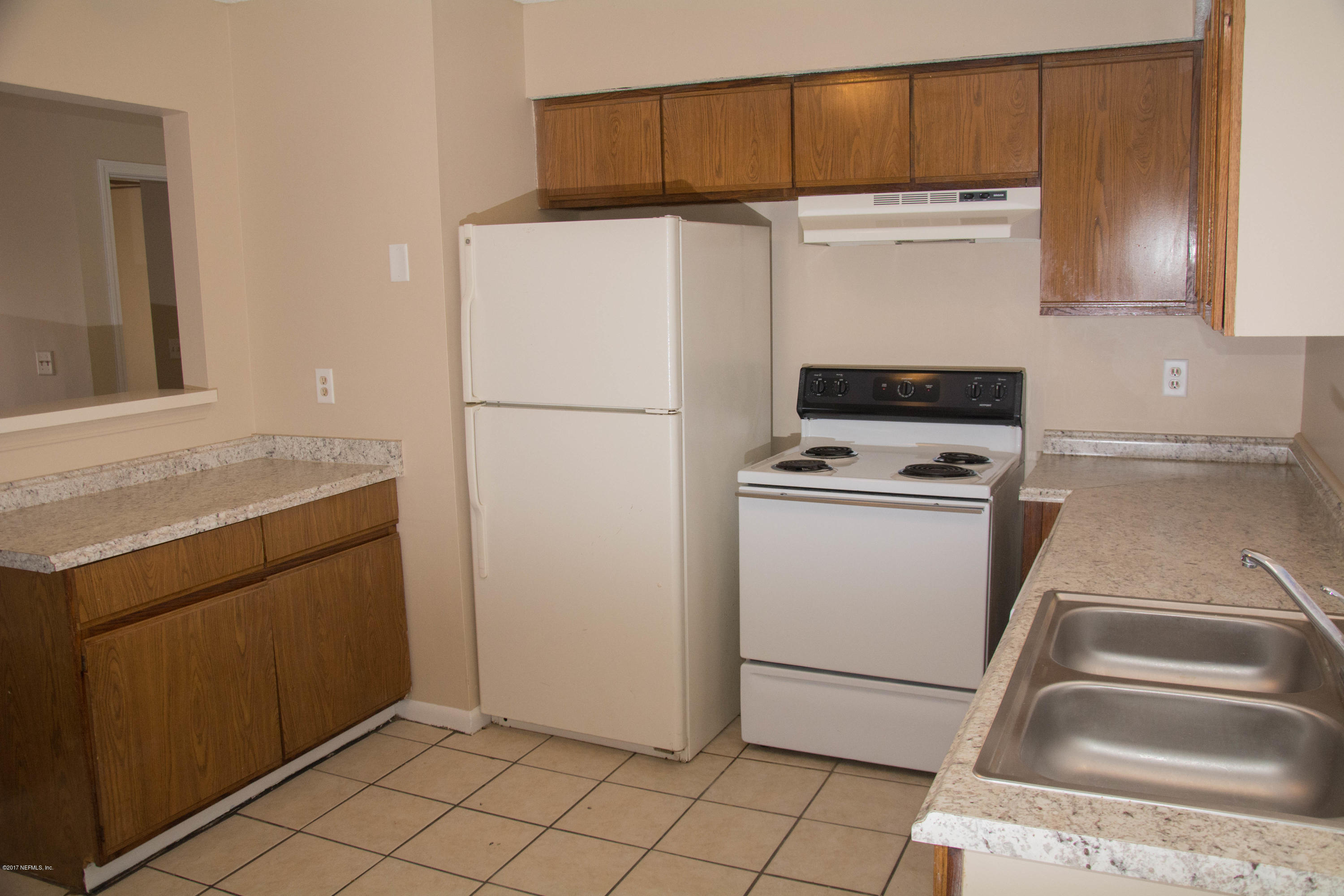 2630 Jammes Road, Unit 403 Jacksonville, FL 32210 - Photo 3 of 10 a utility room with dryer and washer