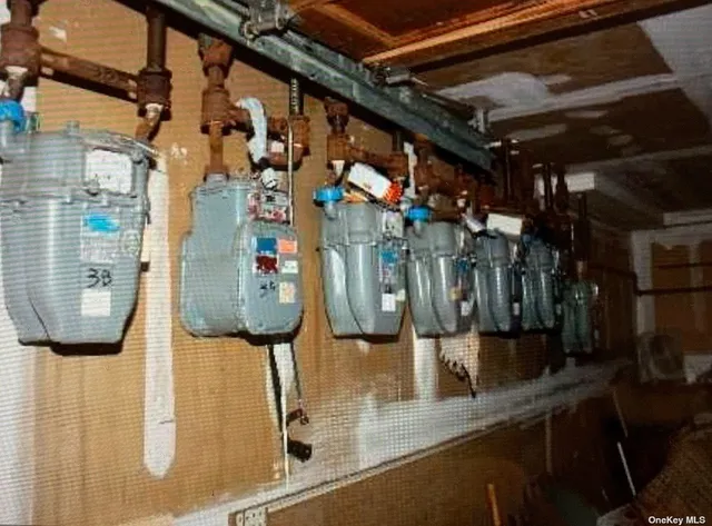 a view of a couches in patio and a fire pit