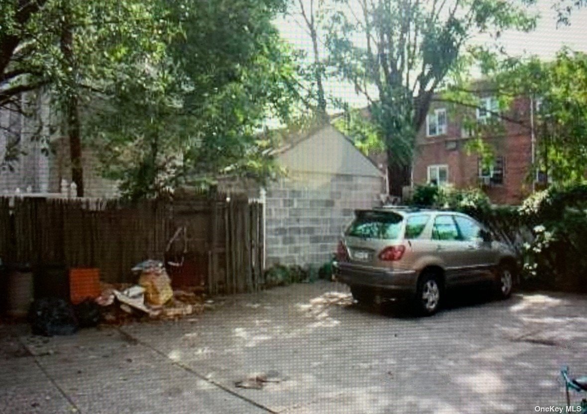 43-65 156th Street Queens, NY 11355 - Photo 6 of 6 a view of a couches in patio and a fire pit