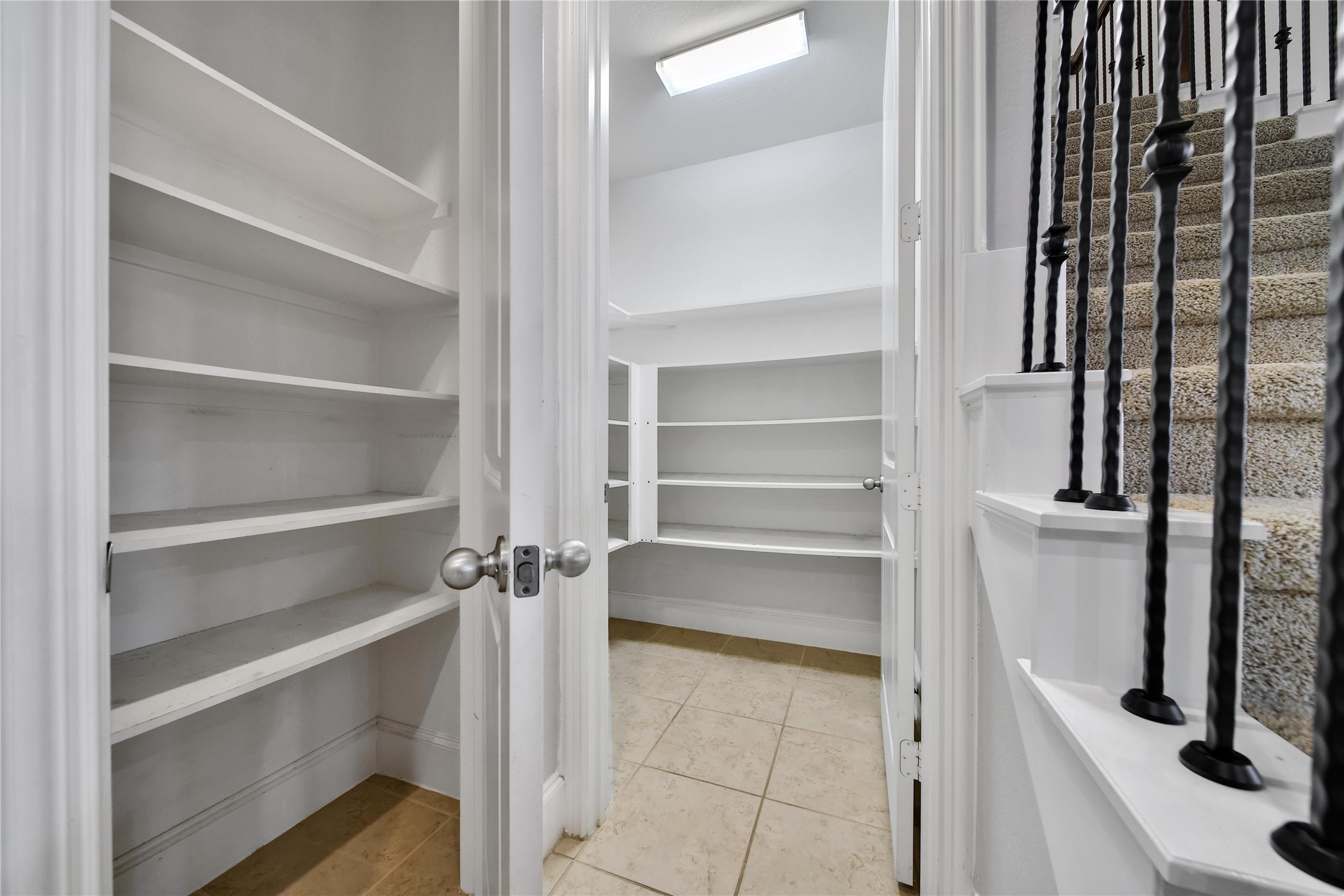 3910 Lupin Bush Lane Manvel, TX 77578 - Photo 11 of 39 a view of walk in closet with empty racks