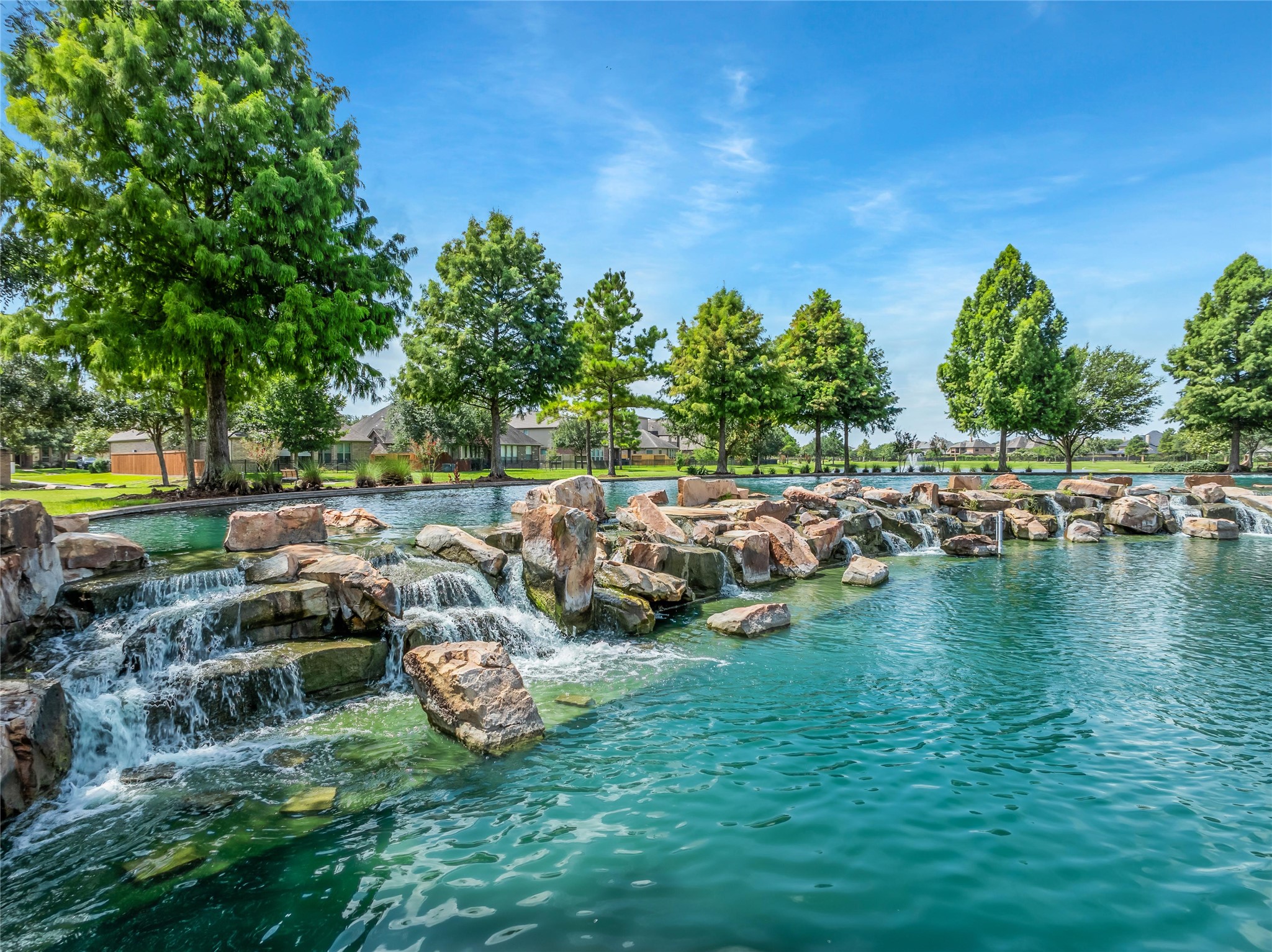 3910 Lupin Bush Lane Manvel, TX 77578 - Photo 26 of 39 a view of a lake with houses