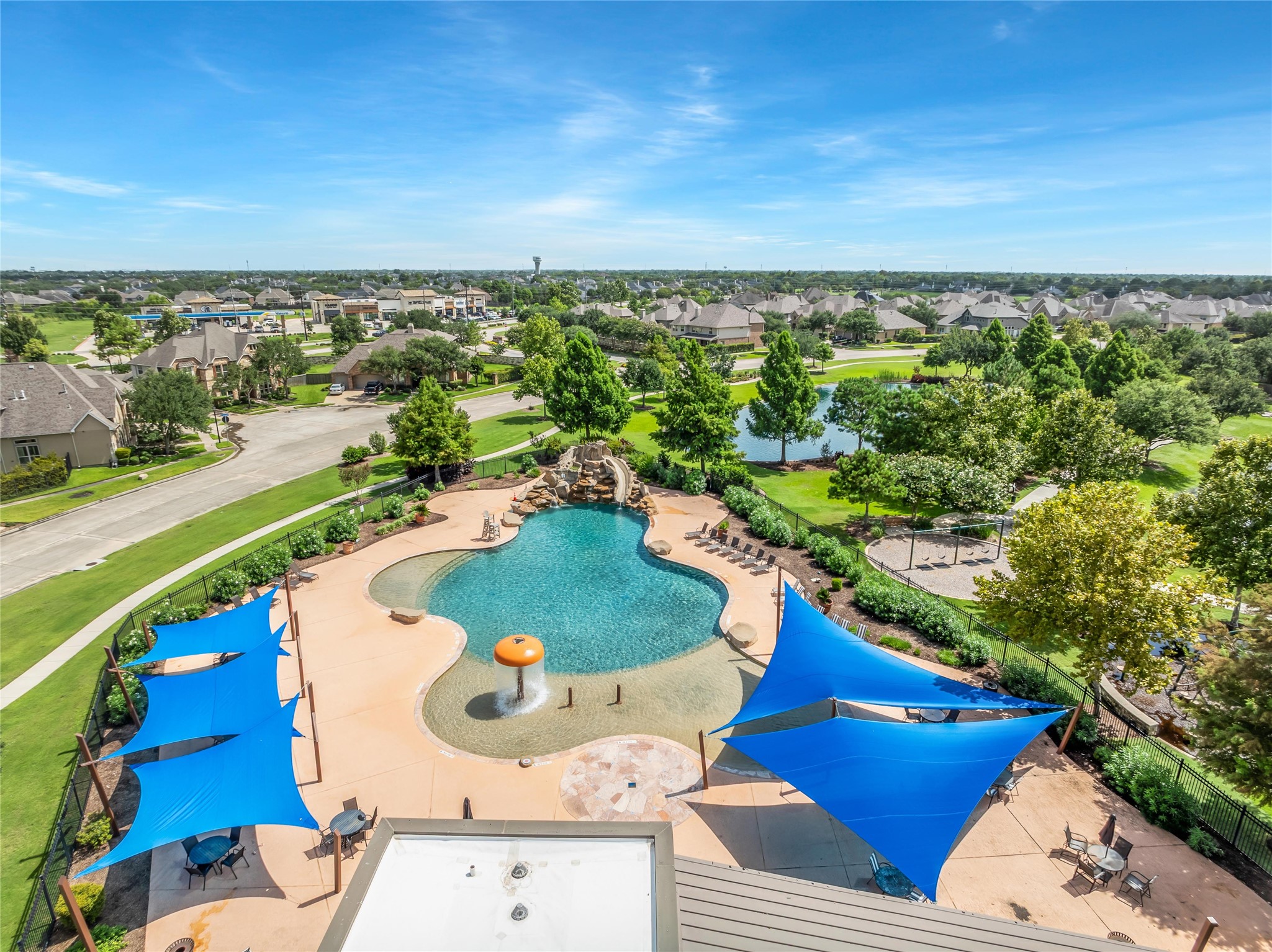 3910 Lupin Bush Lane Manvel, TX 77578 - Photo 31 of 39 an aerial view of a house with a yard and lake view