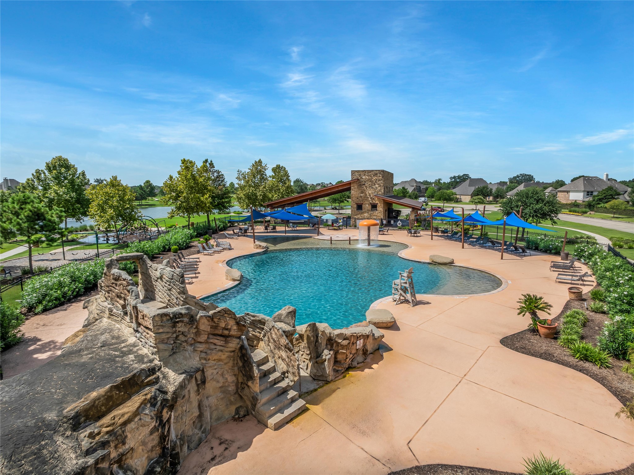 3910 Lupin Bush Lane Manvel, TX 77578 - Photo 33 of 39 a view of a lake with a yard