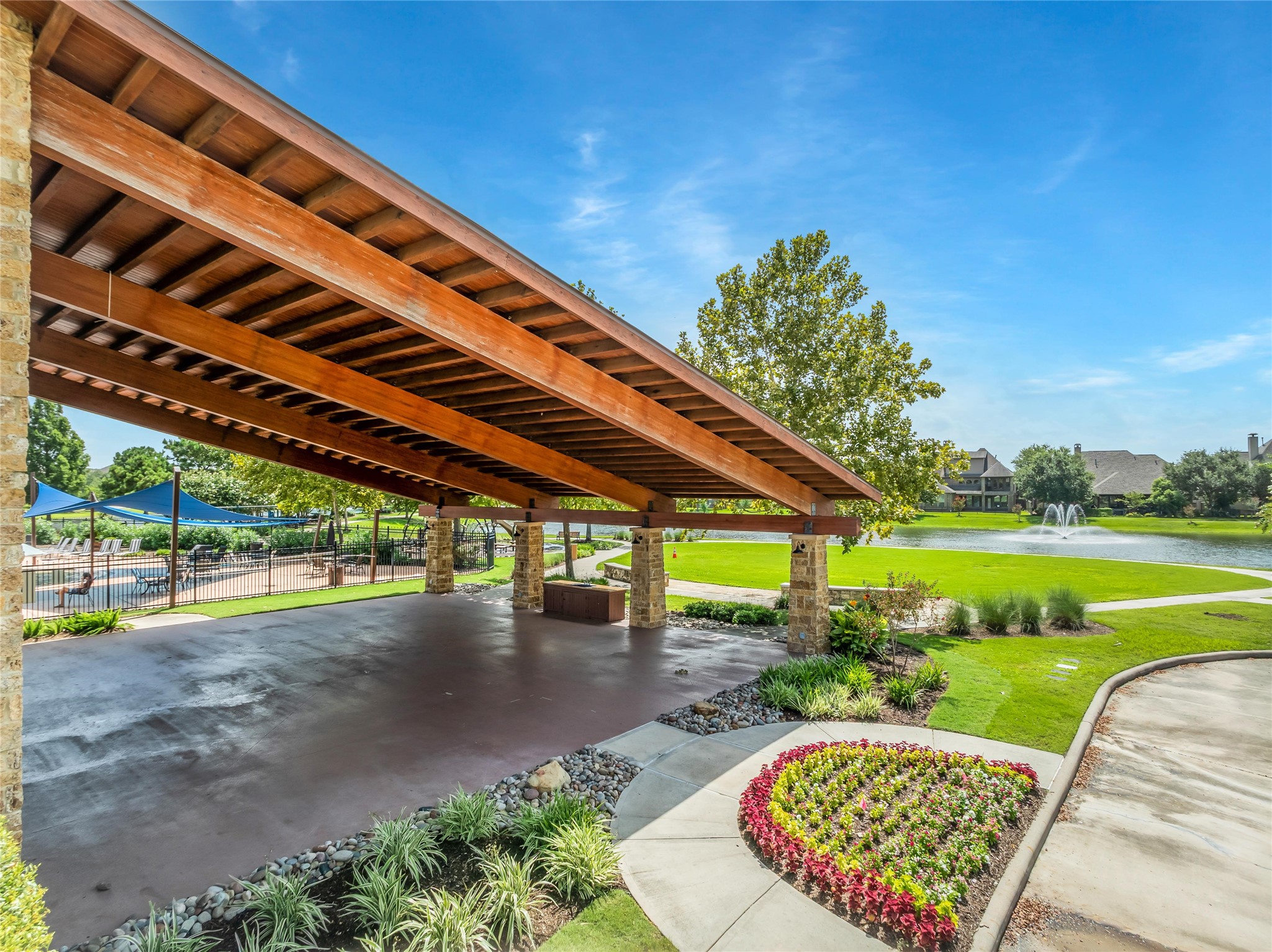 3910 Lupin Bush Lane Manvel, TX 77578 - Photo 35 of 39 a view of a swimming pool with a patio