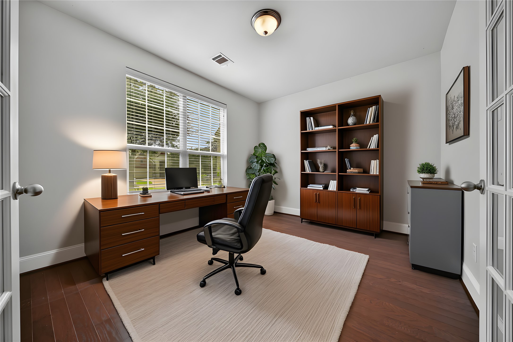 3910 Lupin Bush Lane Manvel, TX 77578 - Photo 4 of 39 a view of a workspace with furniture and a window