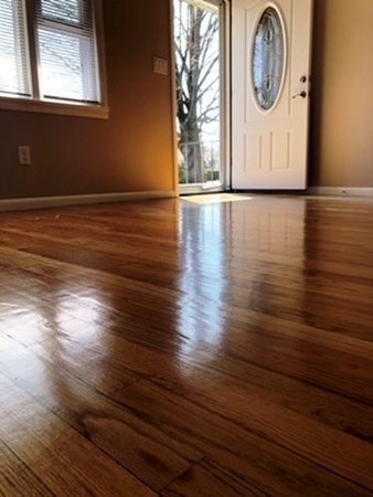 70 Gary Road Springfield, MA 01119 - Photo 11 of 24 a view of empty room with window and wooden floor