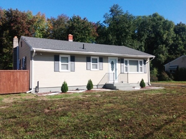 70 Gary Road Springfield, MA 01119 - Photo 2 of 24 a house with trees in the background