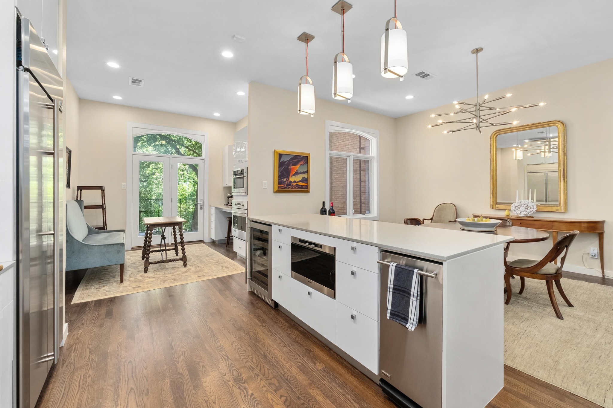 3718 Bridle Path Austin, TX 78703 - Photo 9 of 30 Lovely kitchen with breakfast area capturing backyard greenspace views