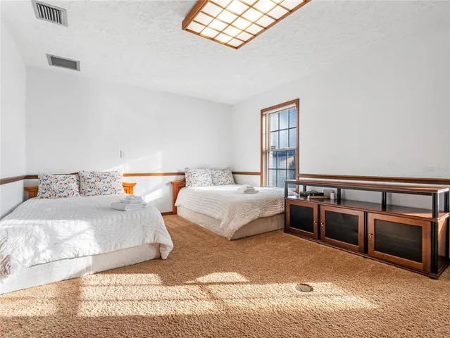a view of a livingroom with furniture window and outside view