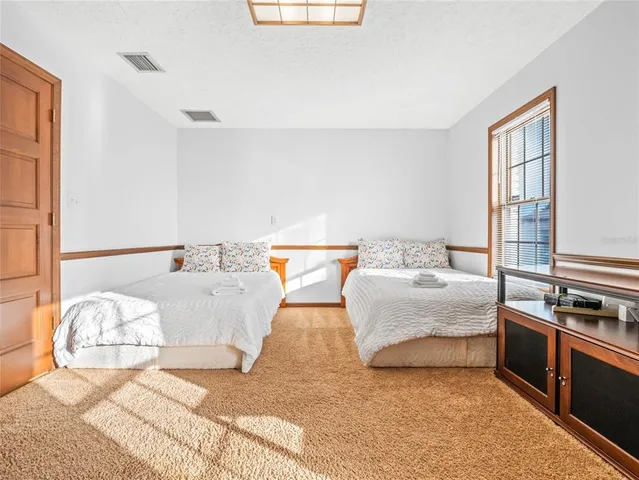 a view of a house with swimming pool