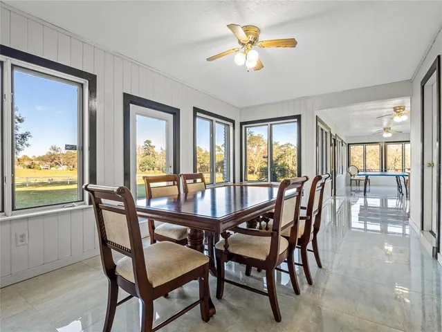 an aerial view of a house with a garden