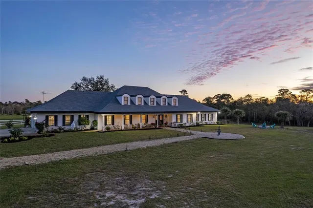 a view of a yard with an outdoor space